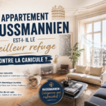 Intérieur lumineux d'un appartement haussmannien avec parquet en point de Hongrie, moulures et grandes fenêtres.